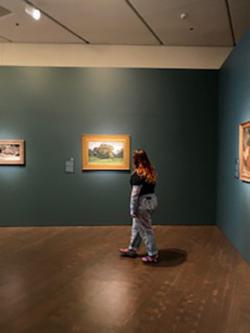 María Aschenbrener'21 walks around in her new place of work: the Denver Art Museum. 