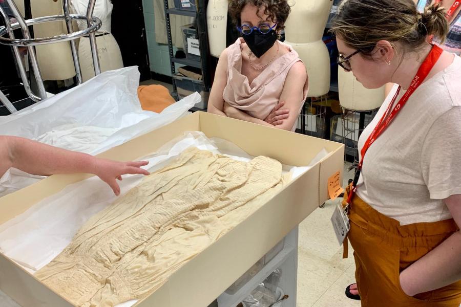 Introduction to Textile Conservation participants visiting the Beloit College Historic Costume Collection.